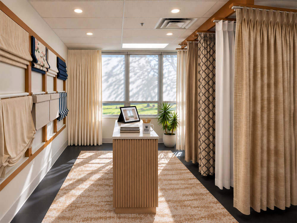 Inside the Regal Drapes showroom in Morristown, New Jersey, displaying custom Roman shades and drapery styles.